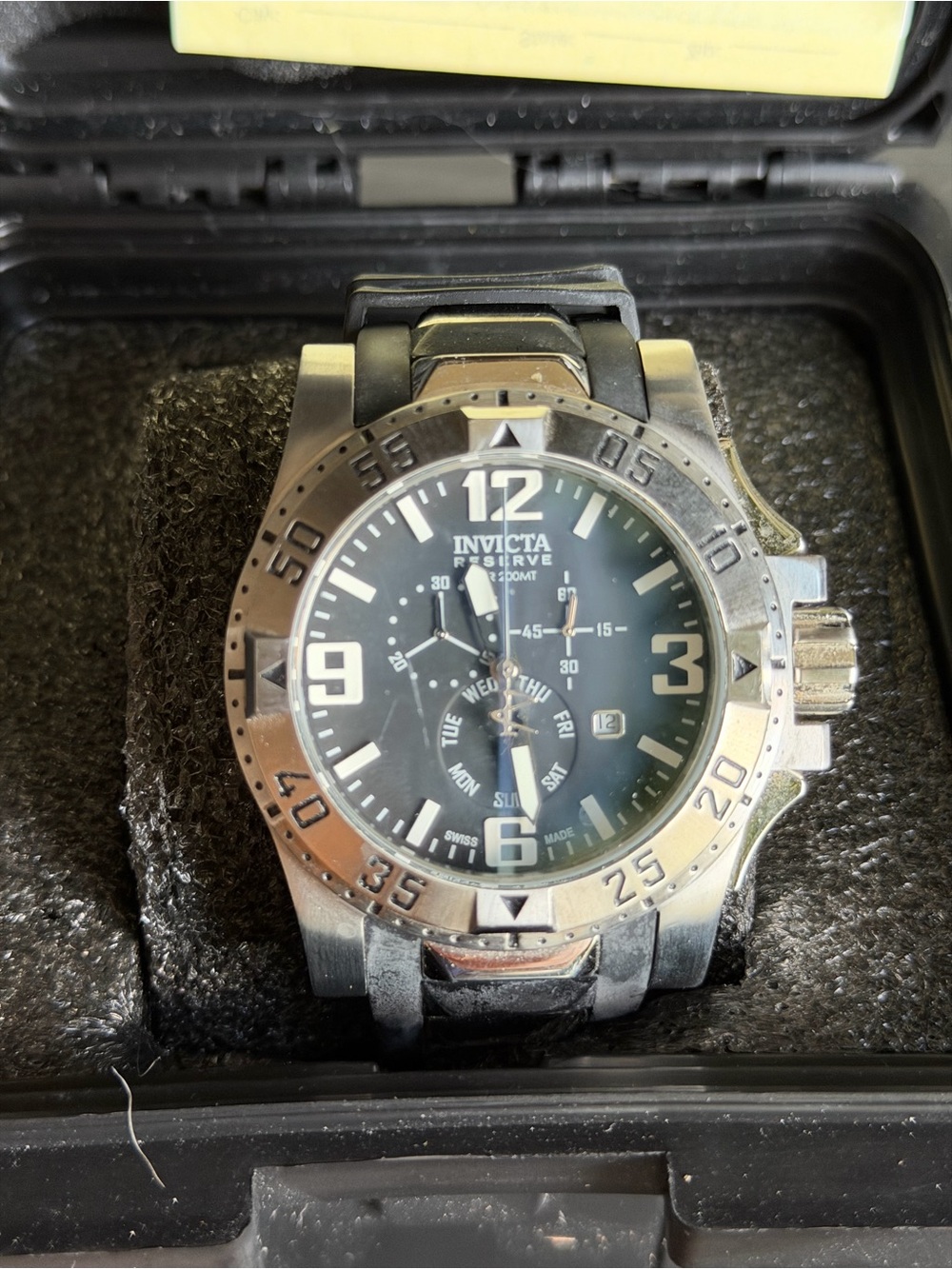 Invicta Silver and Black Watch Buckle with Yellow Tag